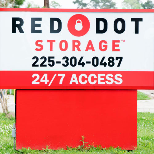 Sign at the street entrance of Red Dot Storage in Denham Springs, Louisiana