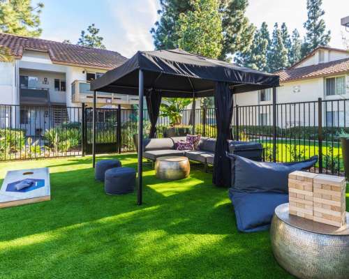 Lawn games and a cabana at Sedona Apartment Homes, Placentia, California