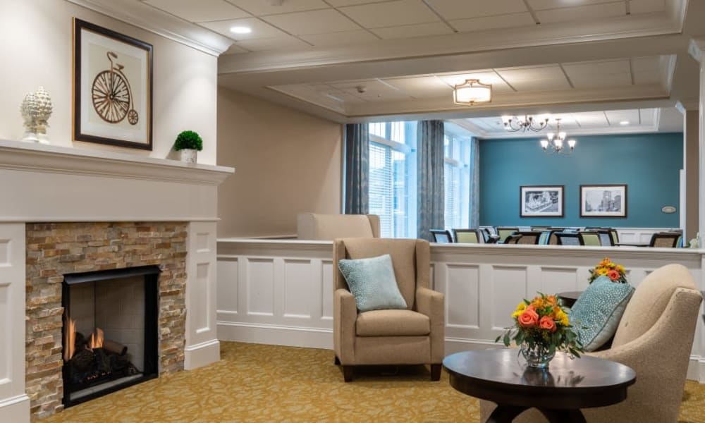 Lounge area with a fireplace at Randall Residence of Centerville in Centerville, Ohio
