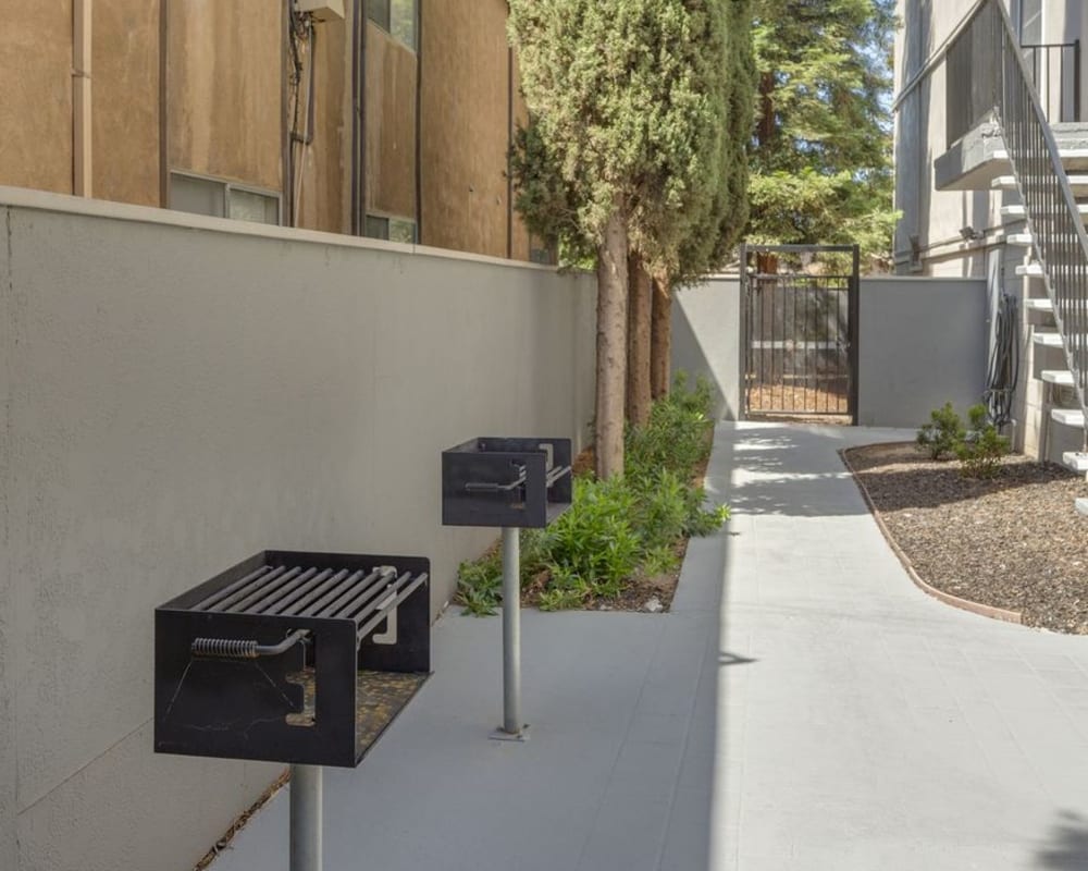 Patio with barbeques at Palace Apartments in Concord, California