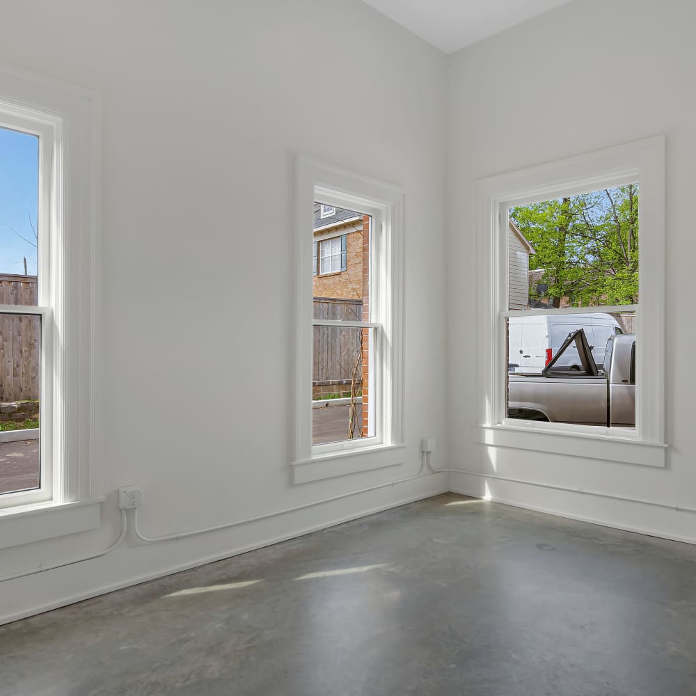 Un furnished area with grey flooring and windows at 189 Barksdale in Memphis, Tennessee