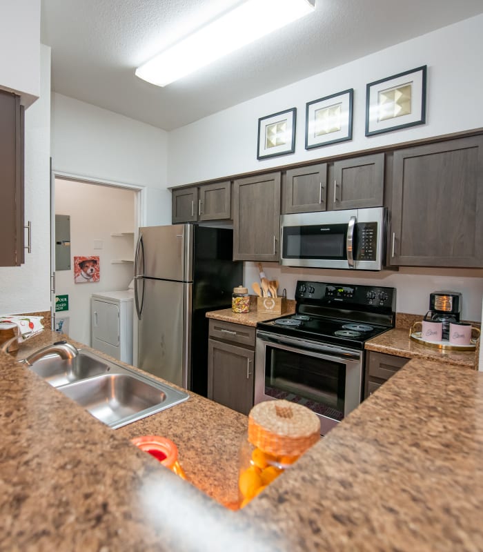 Kitchen with granite countertops at Arbors of Pleasant Valley in Little Rock, Arkansas