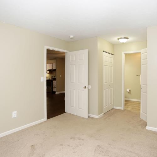 Unfurnished bedroom with attached bathroom at Spring Lake Apartments in Granger, Indiana