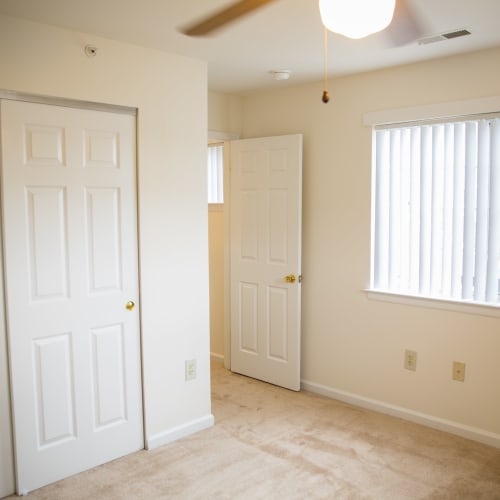 A bedroom at Dahlgren Townhomes in Dahlgren, Virginia