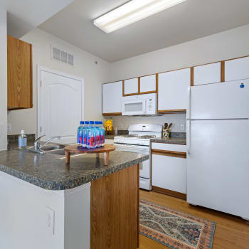 A staged kitchen at Cypress Creek at Fayridge in Houston, Texas