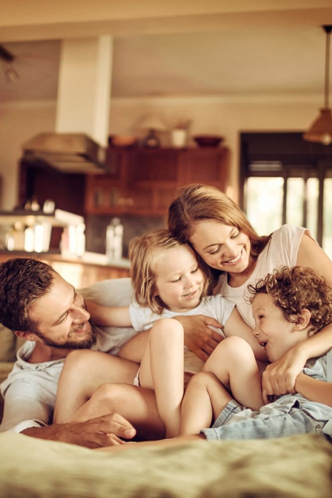 Resident family relaxing in their home at Six 10 Flats in Bethlehem, Pennsylvania