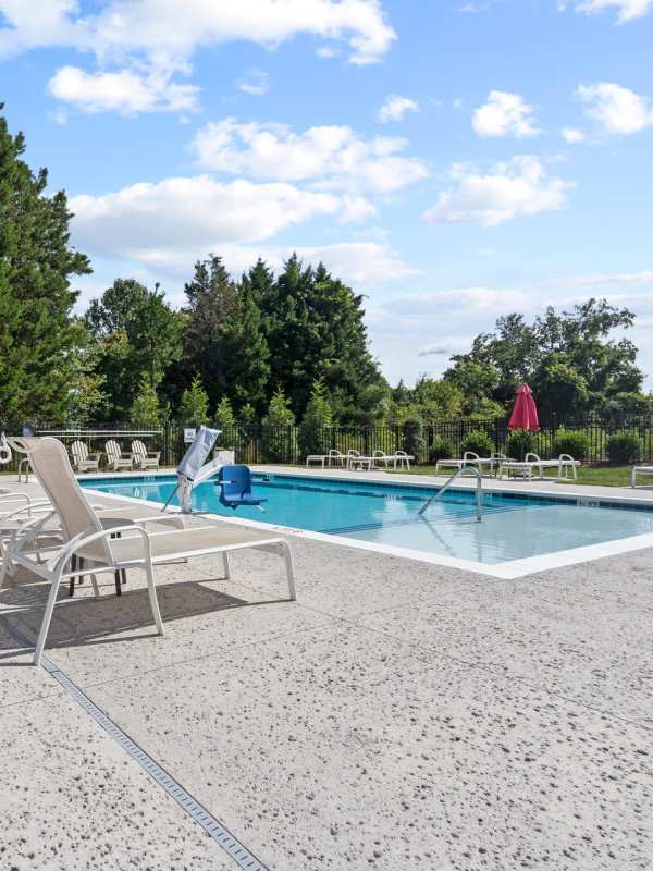 Swimming pool with lounge beds at Hawks Landing in Hickory, North Carolina