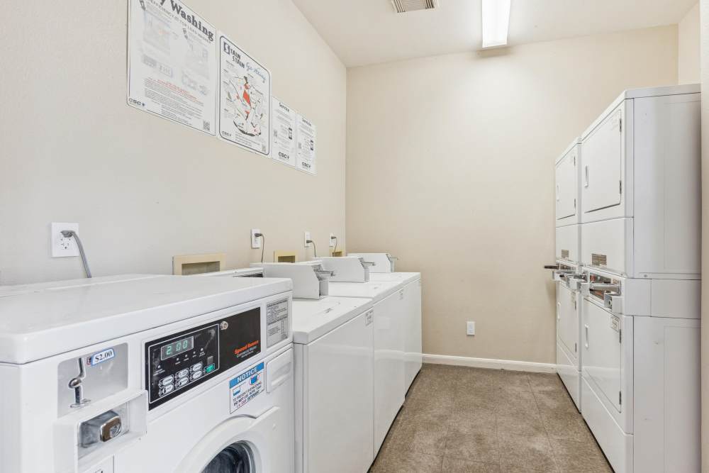 Washer and dryer at Brazoswood Apartments in Clute, Texas