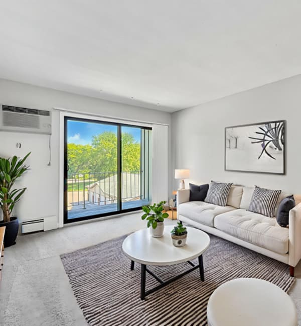 Modern living room at Equinox Apartments in Saint Anthony, Minnesota