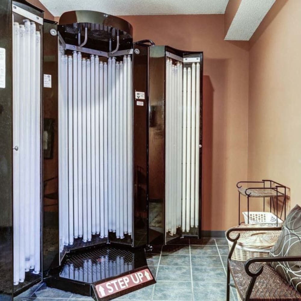 Resident clubhouse at Springhill Apartments features a standup tanning bed in Overland Park, Kansas
