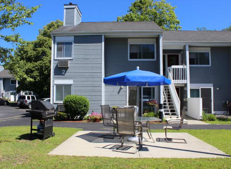 Manicured grounds with gazebo at Merrimack Valley Apartments in Methuen, Massachusetts