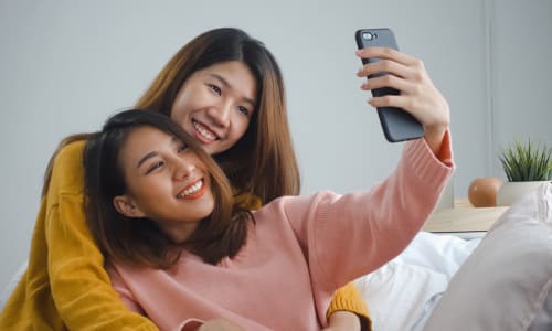 Residents taking a selfie at La Privada Apartments in El Paso, Texas