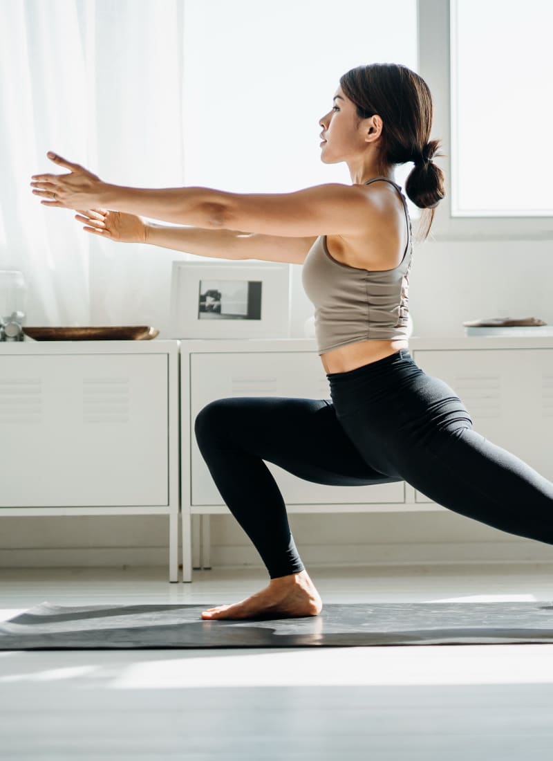 Woman practices yoga near Marquis on Memorial in Houston, Texas