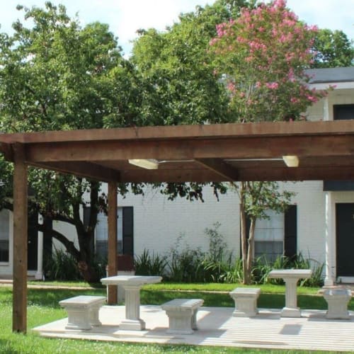 Picnic tables at Midtown Manor and Towers in Bryan, Texas