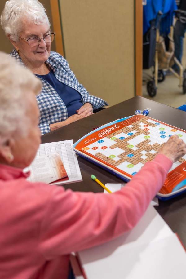 Residents playing scrabble at Merrill Gardens in Seattle, Washington
