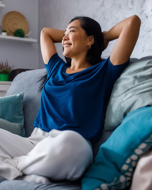 Resident relaxing in her new home at Parallel 36 at Jailette in Atlanta, Georgia