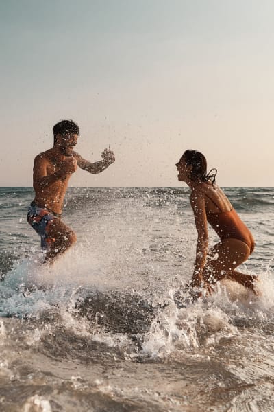 Residents playing in the ocean near Nine20 Manatee in Bradenton, Florida