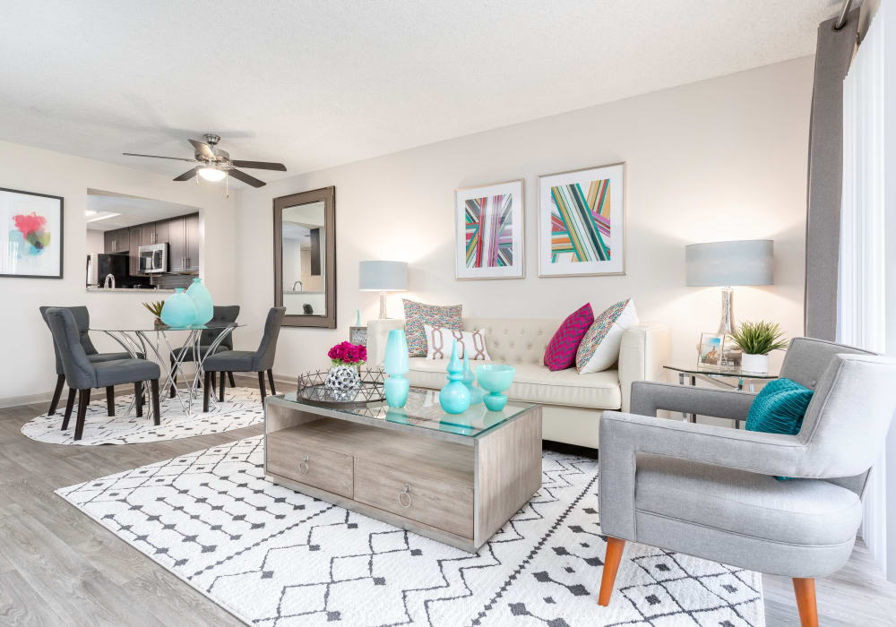 Modern decor in open-concept living area in model home at Siena Apartments in Plantation, Florida