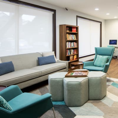 Beautifully decorated lobby interior with comfortable seating at Sofi Gaslight Commons in South Orange, New Jersey