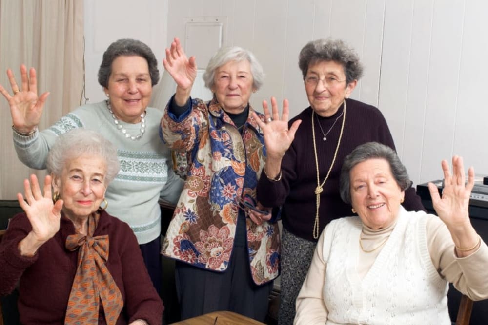 Waving residents at Absaroka Senior Living in Cody, Wyoming.