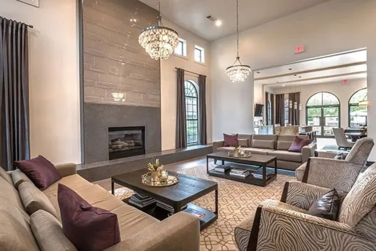Seating around a fireplace in the clubhouse at Reserve at Stonebridge Ranch in McKinney, Texas