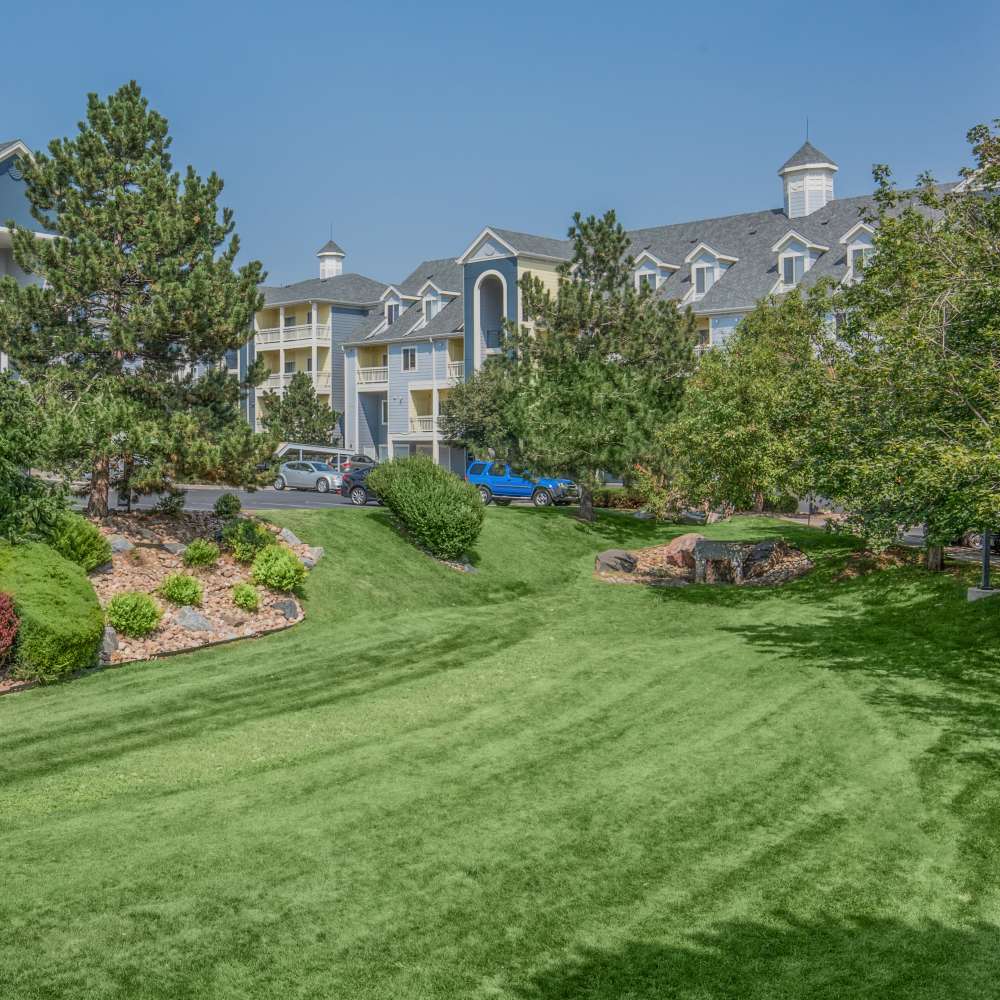 Community view with greenery around at One Belmar Place in Lakewood, Colorado