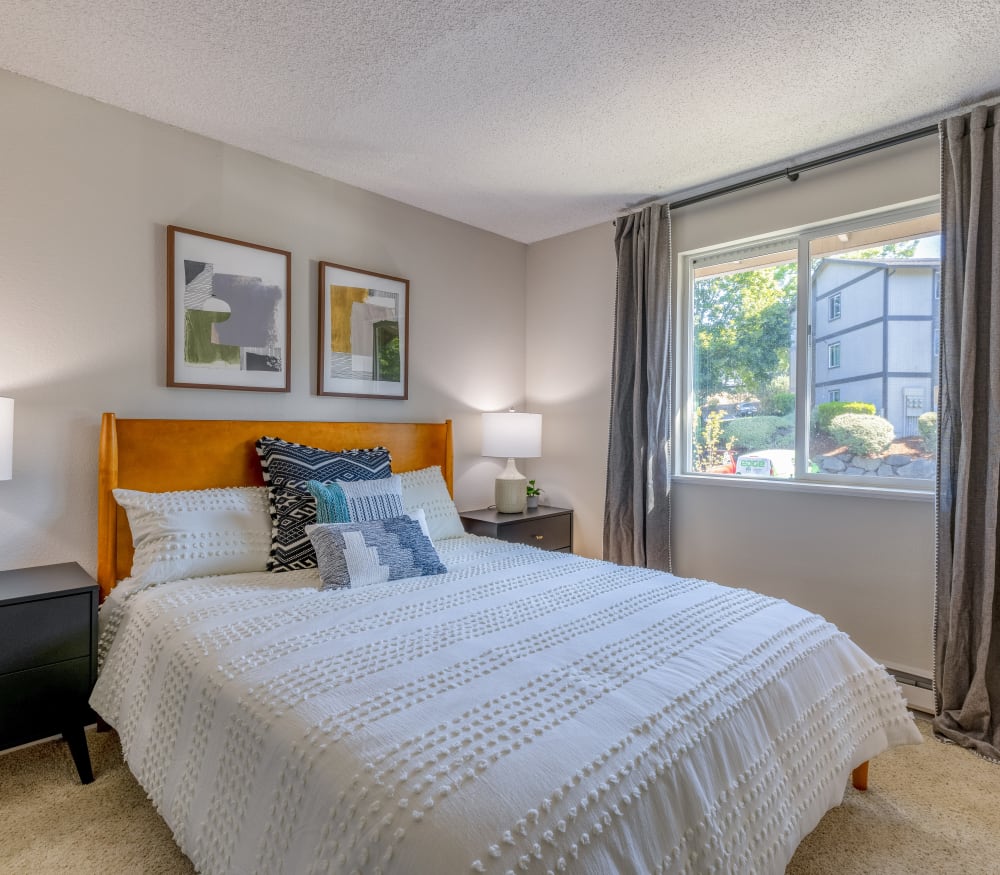 Peaceful and spacious bedroom in a model home at Haven Apartment Homes in Kent, Washington 