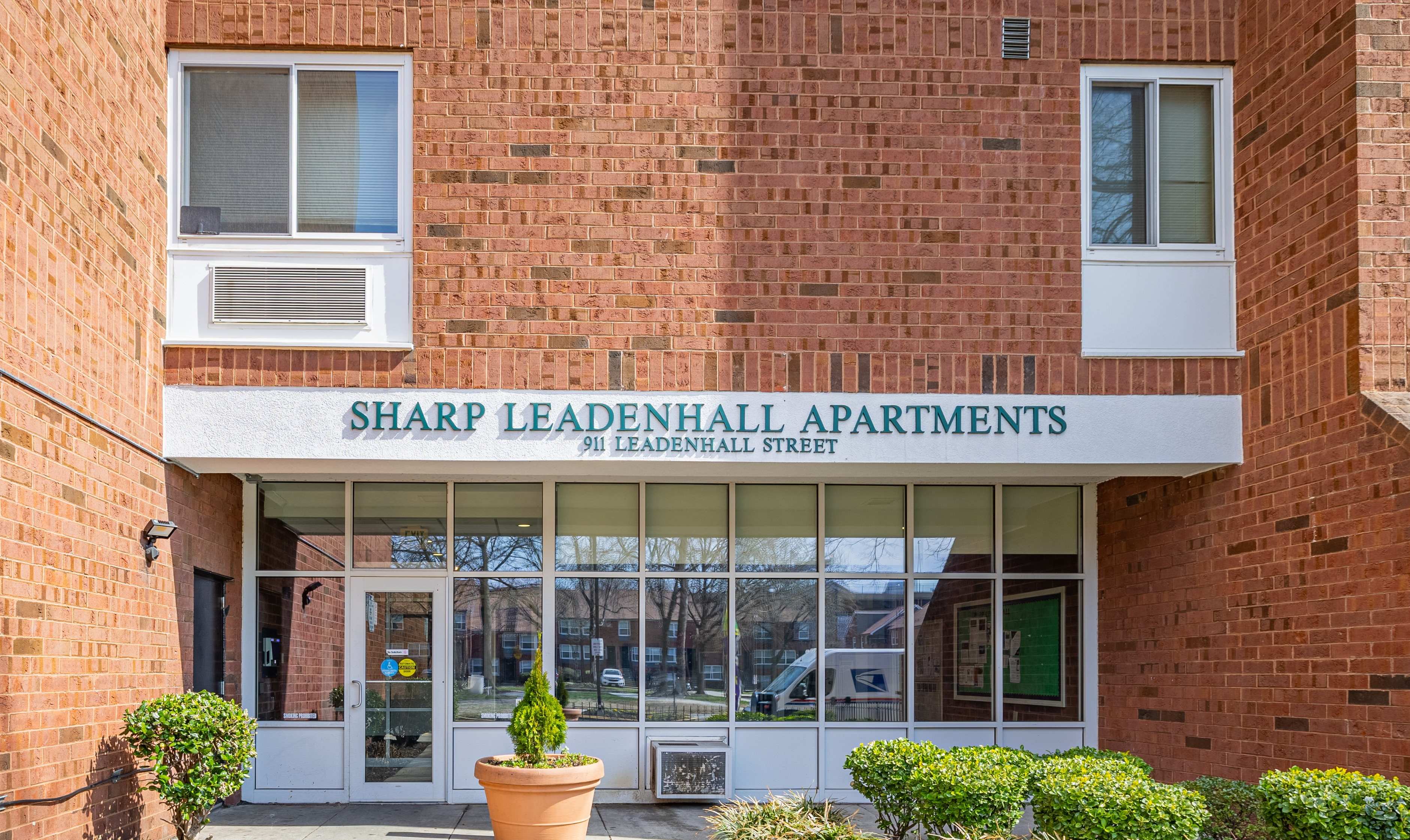 Exterior Leasing Office Entrance at Sharp Leadenhall Apartments in Baltimore, Maryland