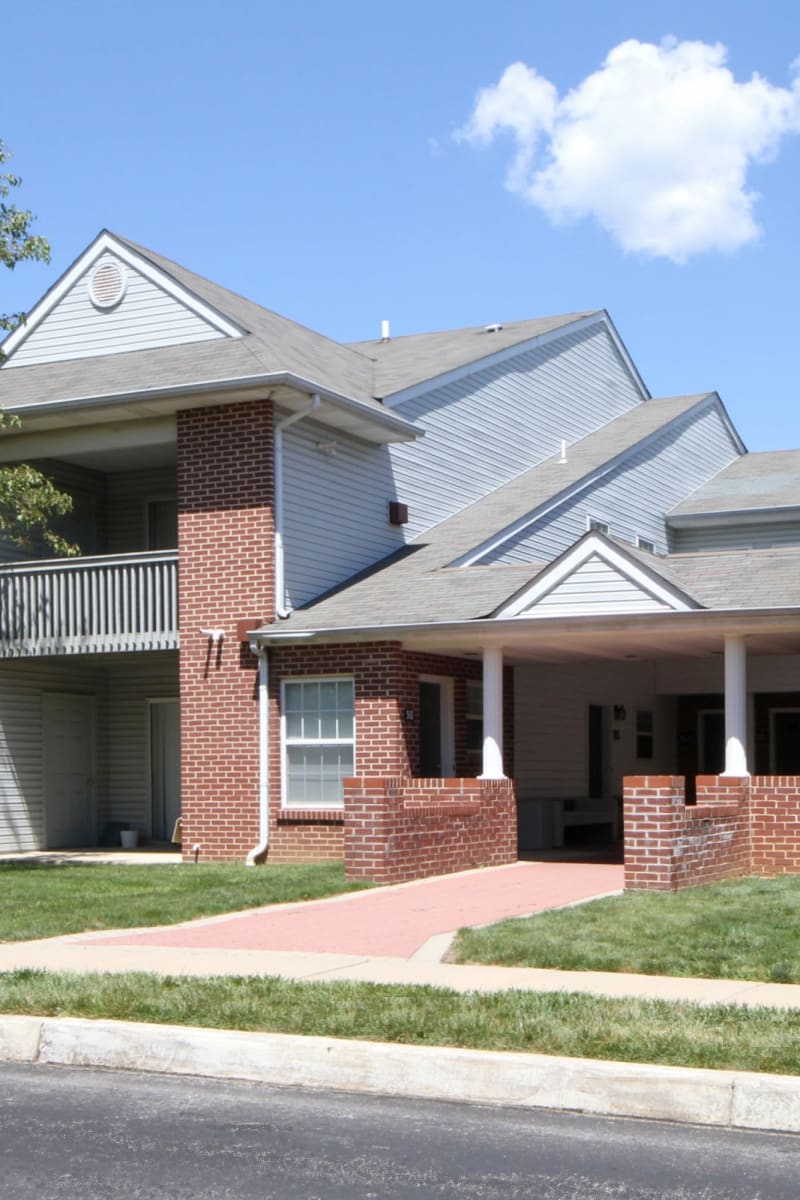 Exterior of Creekside at Greenlawn Apartment Homes on a sunny spring day in Columbia, South Carolina