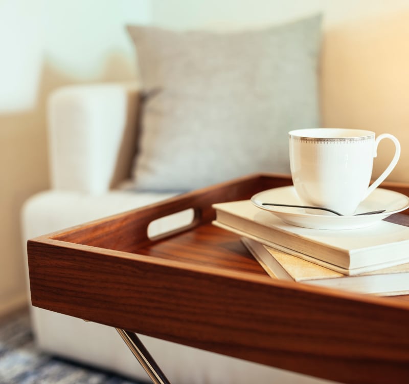Coffee cup and books at The Manor at Spring Lake