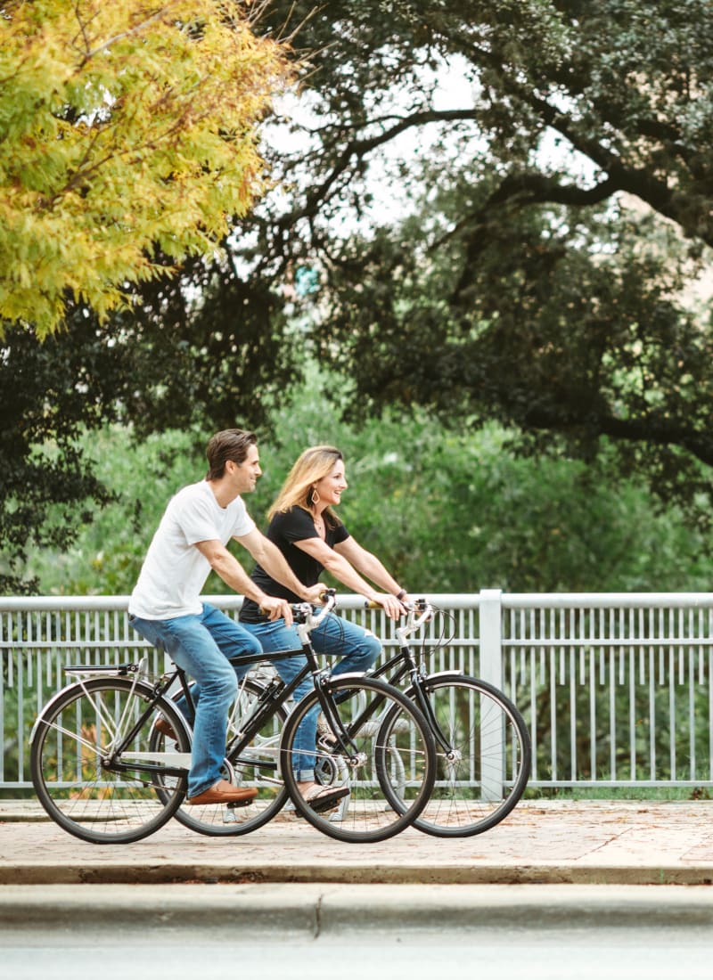 Friends biking near Marquis at Legacy in Plano, Texas