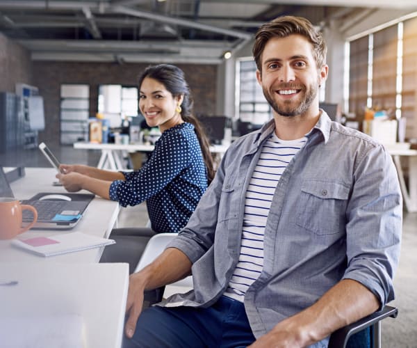 Couple sitting at office table in Denver