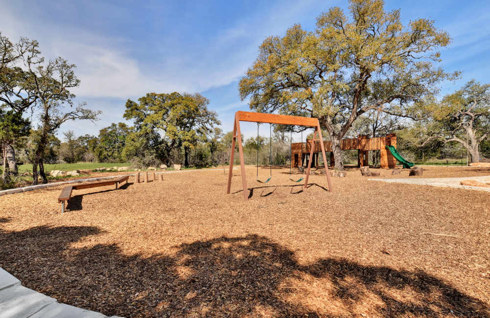 Playground in the community at Homestead Oaks Apartments in Austin, Texas