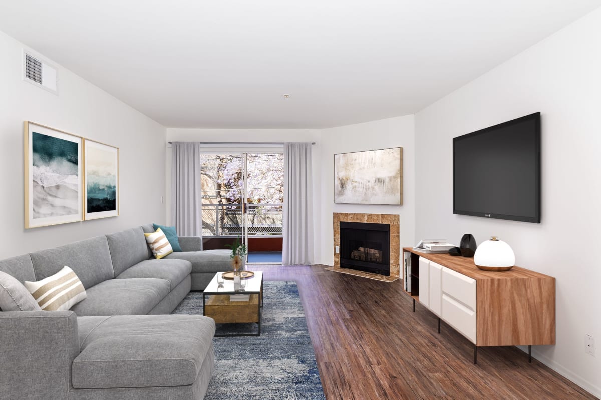 Spacious apartment with wood-style flooring at Marlon Manor Apartments, Los Angeles, California