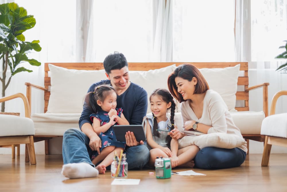 A resident family enjoying a Saturday in their home at Kensington at Beverly Hills in Southfield, Michigan