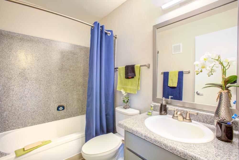 Clean and bright model bathroom at Verde Apartments in Tucson, Arizona