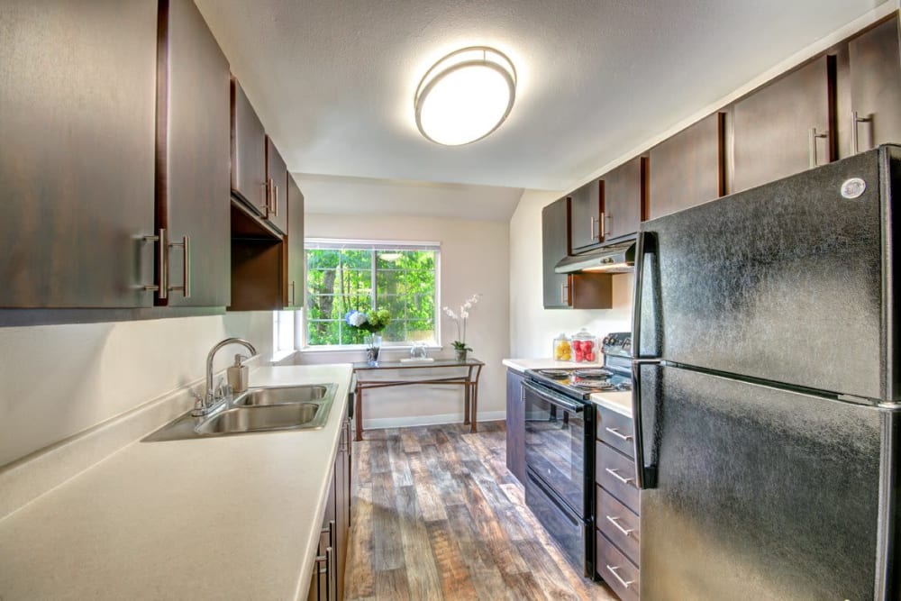 A updated kitchen at Wellington Apartment Homes in Silverdale, Washington