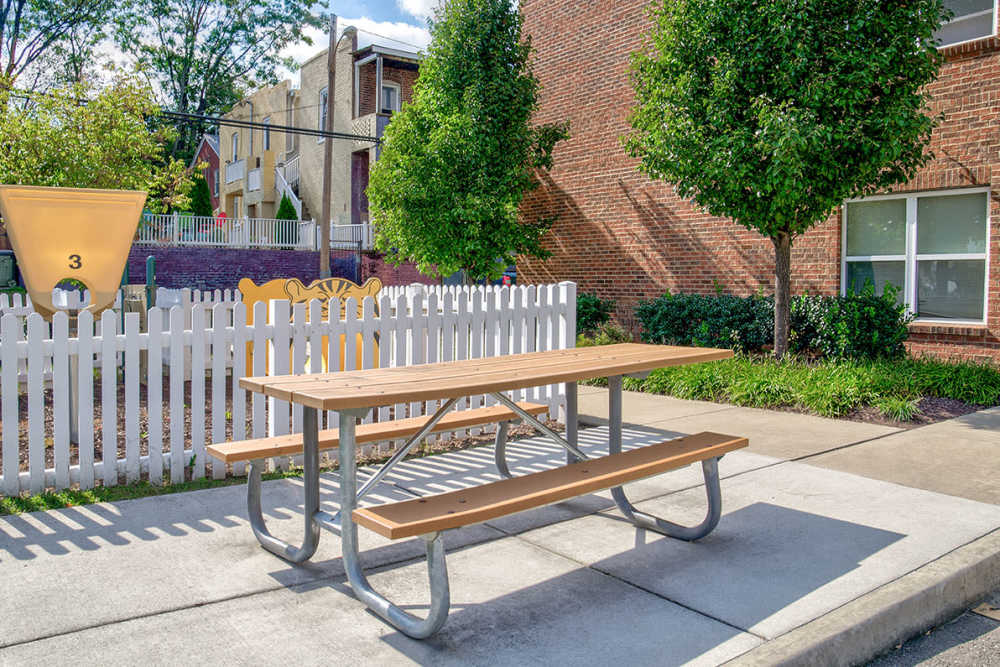 Outdoor seating area beside the paly area at City View Place in Richmond, Virginia
