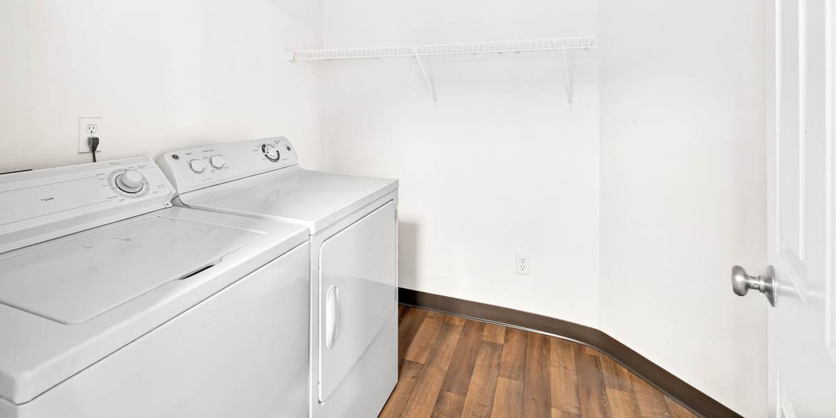 Full sized washer and dryer at Wildreed Apartments in Everett, Washington