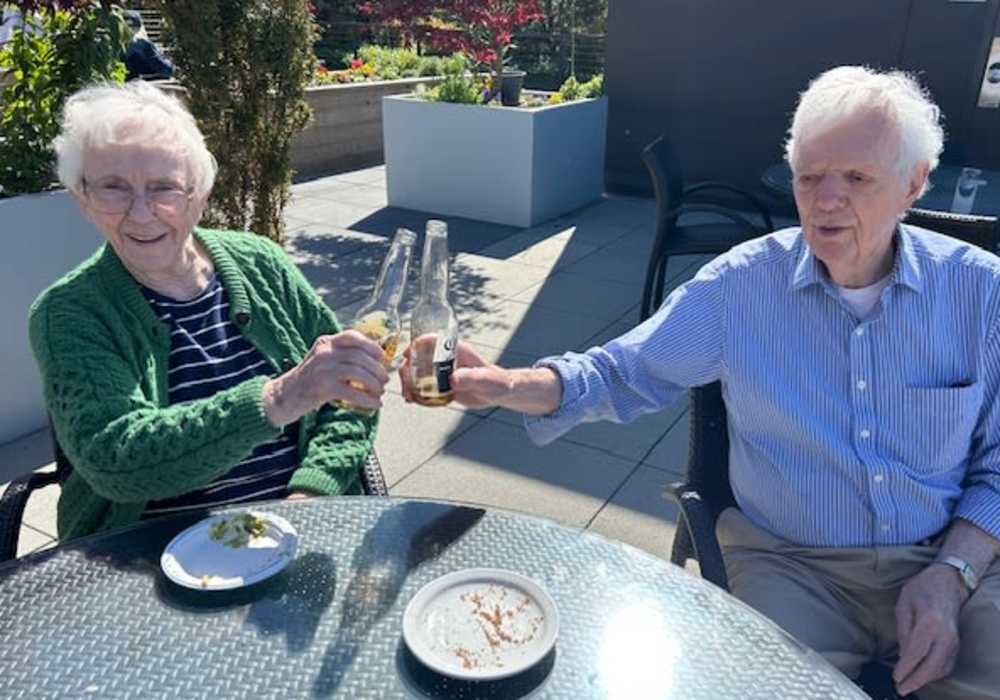 Residents enjoying at toast at Merrill Gardens at Wright Park in Tacoma, Washington