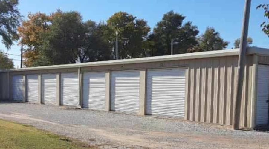 Exterior view of storage units with white doors at KO Storage of Hutchinson in Hutchinson, Kansas