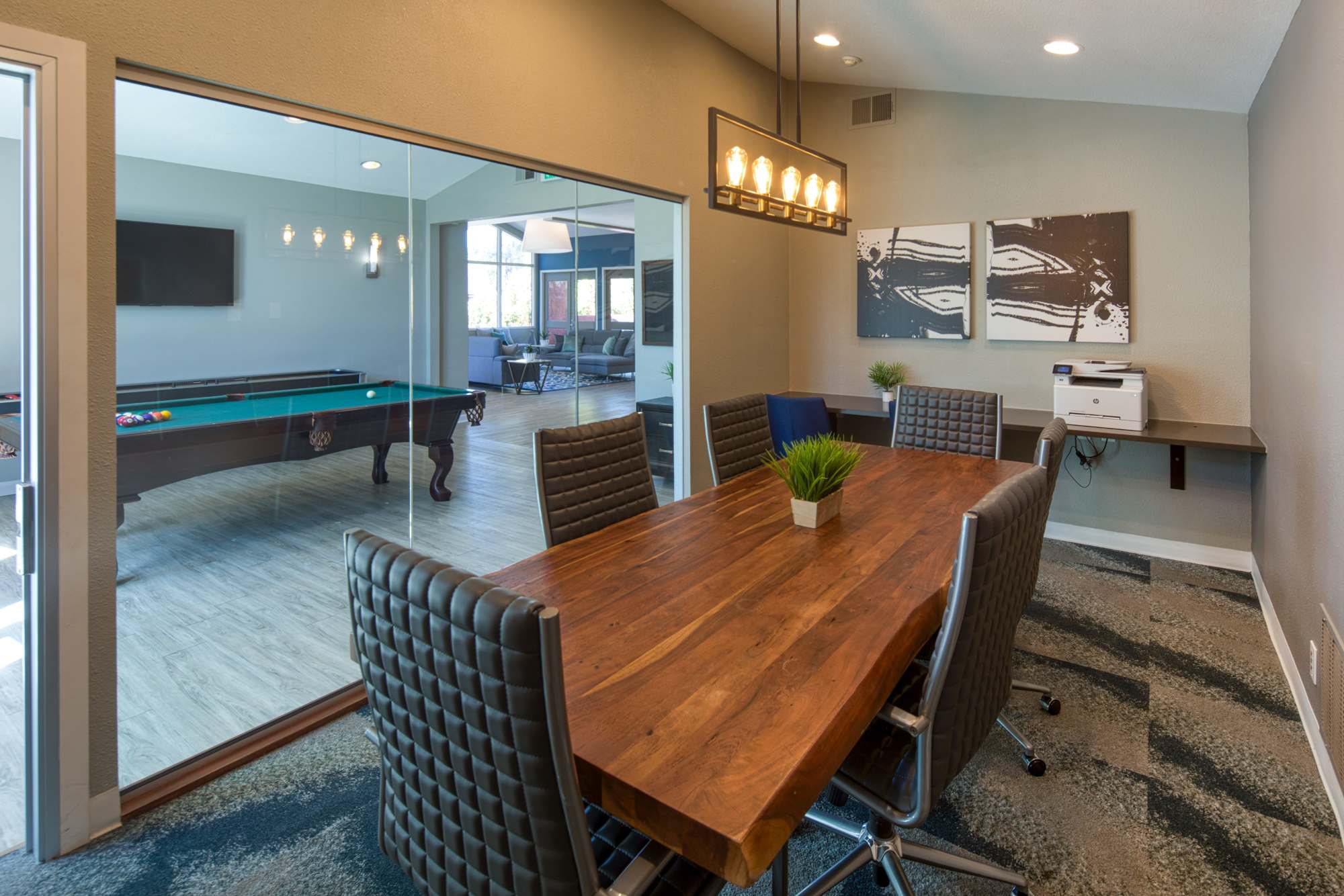 Meeting room with large table and chairs at Falls at Arden in Sacramento, California