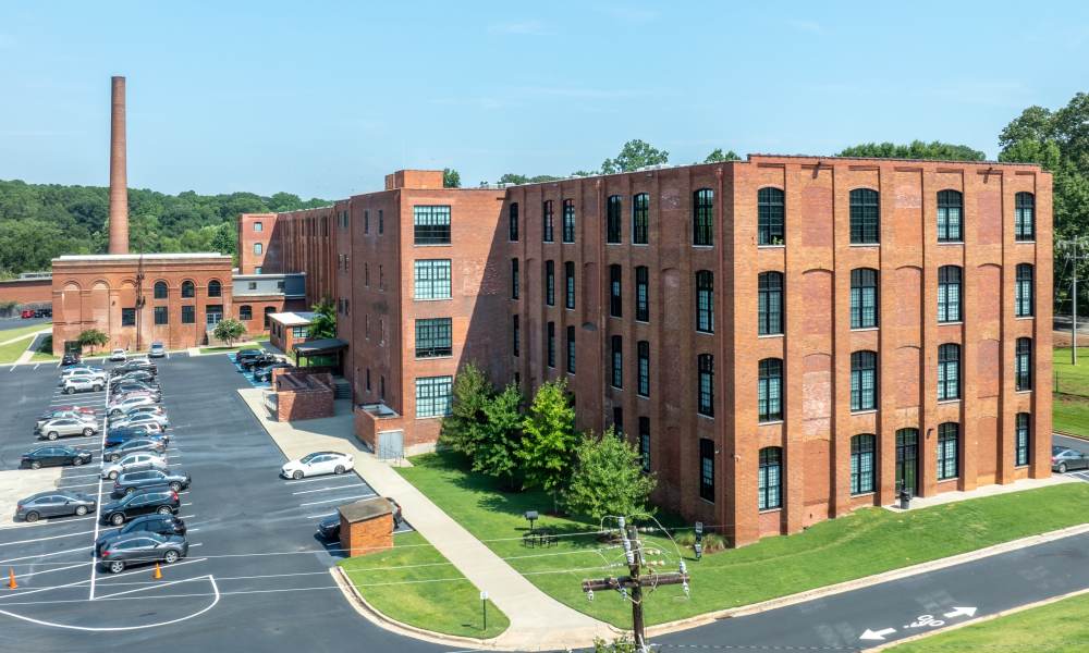 EXterior shot of communtiy at Lofts at Inman Mills in Inman, South Carolina