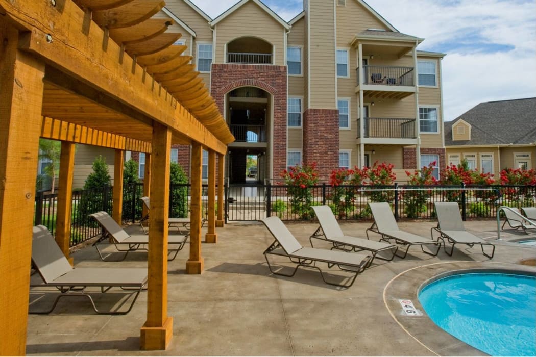 Resort-style poolside lounge at Tuscany Place in Lubbock, Texas.