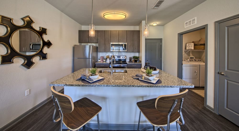 Modern kitchen with island at Venue Live Oak in Sarasota, Florida