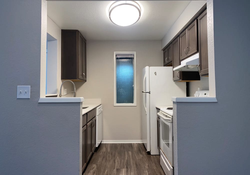 Kitchen with dark cabinets at Autumn Chase in Bothell, Washington