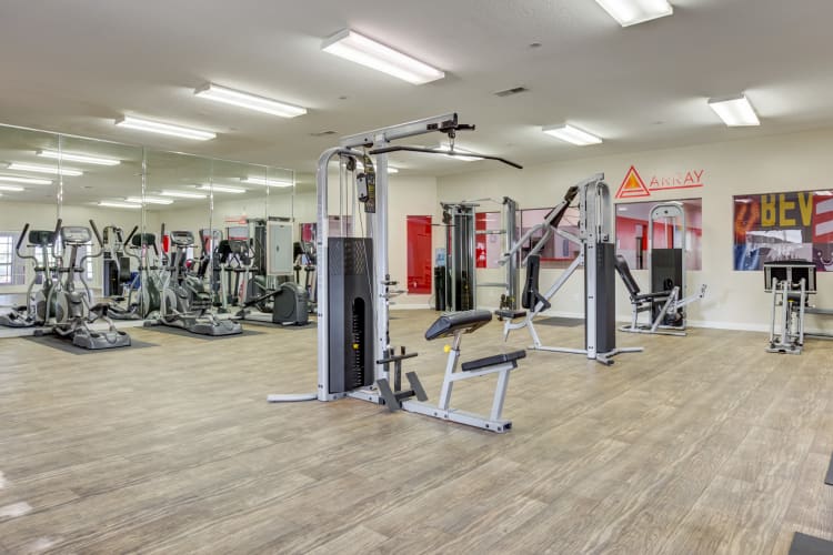 Community fitness center with individual workout stationns at Array Apartments in Austin, Texas