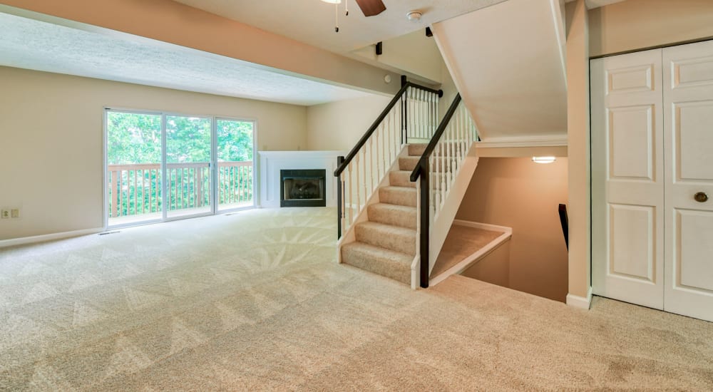 Spacious apartment with a fireplace at Hawthorne Community in Oakdale, Pennsylvania