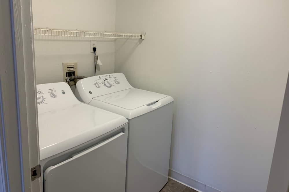 A laundry room at Summit at Mill Ridge in East Haven, Connecticut
