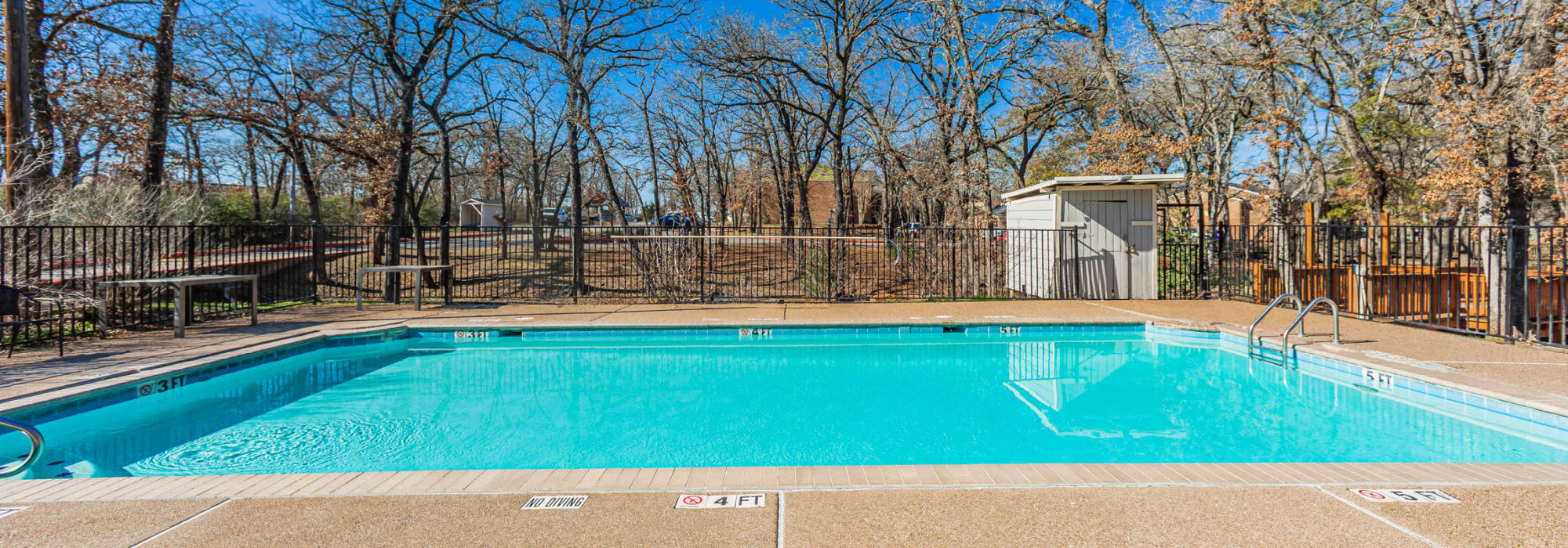 Sparkling swimming pool at Retreat at 2818 in Bryan, Texas